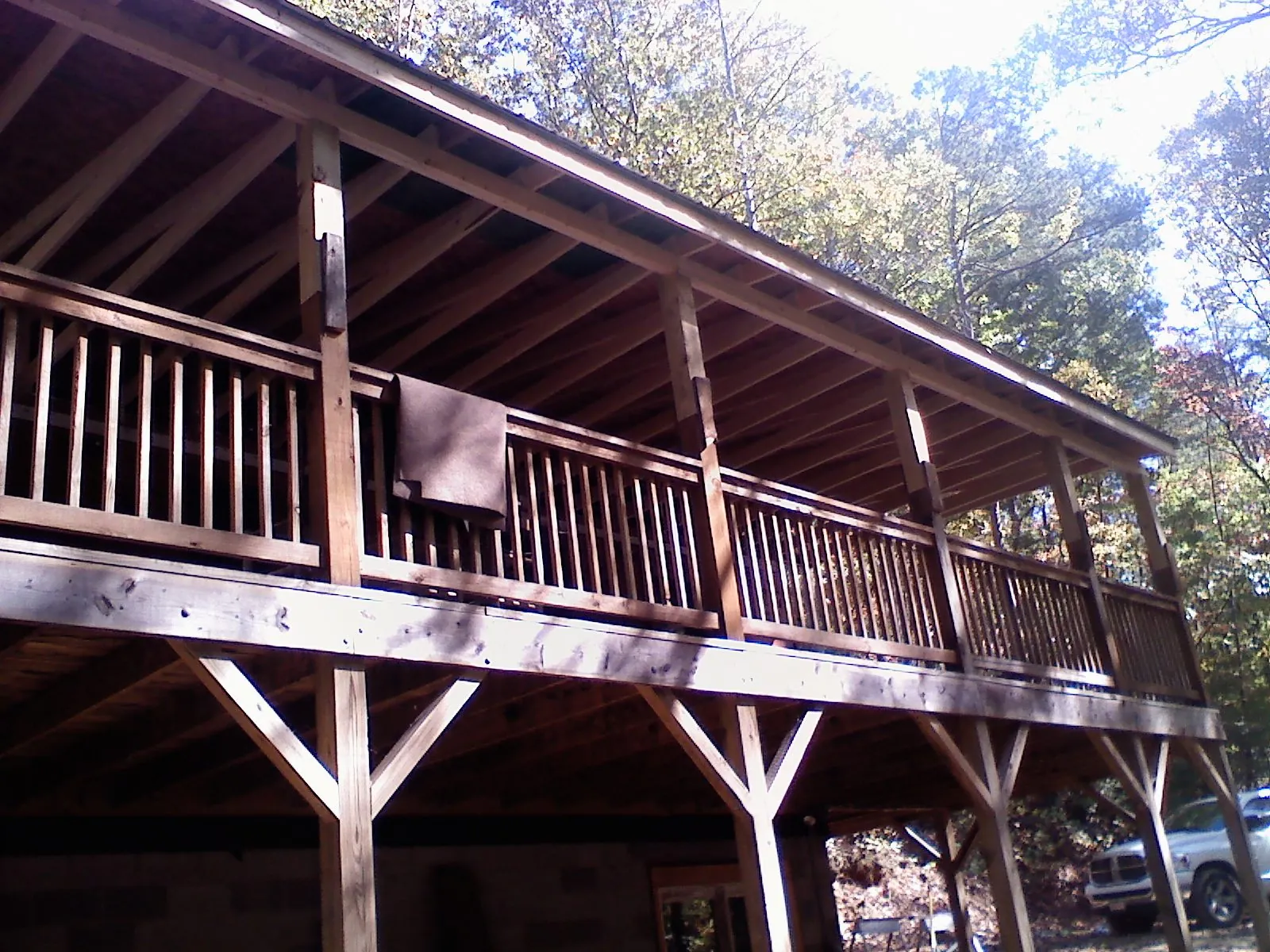 Timber framing under a new elevated porch and deck — Roof Leak Repair in Yorktown Heights by Roofing Brothers